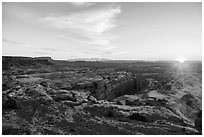 Sunrise over Jasper Canyon from Petes Mesa. Canyonlands National Park, Utah, USA. (black and white)