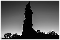 Standing Rock silhouette at sunrise. Canyonlands National Park, Utah, USA. (black and white)