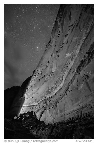 Illuminated canyon wall with rock art under starry sky, Horseshoe Canyon. Canyonlands National Park (black and white)