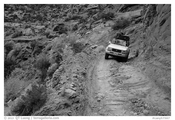 High clearance four-wheel-drive vehicle on the Flint Trail,  Orange Cliffs Unit,  Glen Canyon National Recreation Area, Utah. USA