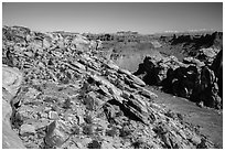 Park visitor looking, Surprise Valley overlook. Canyonlands National Park, Utah, USA. (black and white)