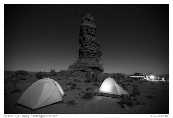 Camp at the base of Standing Rock at night. Canyonlands National Park, Utah, USA.