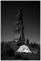 Tent at the base of Standing Rock at night. Canyonlands National Park ( black and white)