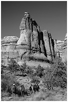 Hikers at the bottom of the Maze. Canyonlands National Park, Utah, USA. (black and white)