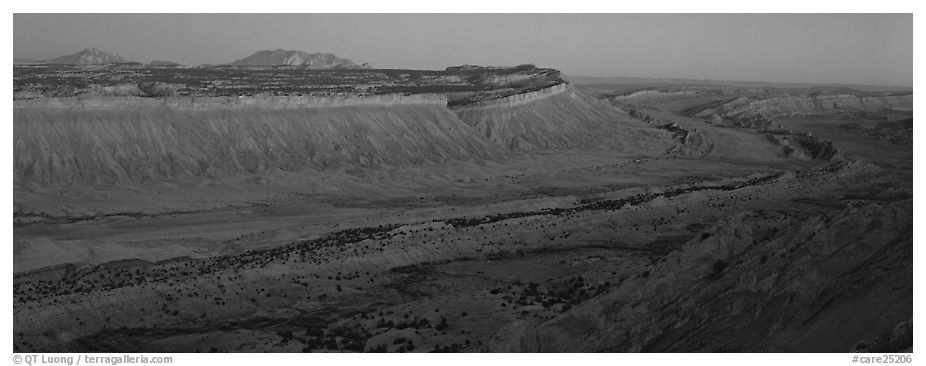 Long chain of cliffs of the Waterpocket Fold at dusk. Capitol Reef National Park (black and white)