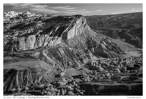 Waterpocket Fold cliffs and orchards from Rim Overlook in the fall. Capitol Reef National Park, Utah, USA.