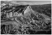 Waterpocket Fold cliffs and orchards from Rim Overlook in the fall. Capitol Reef National Park, Utah, USA. (black and white)