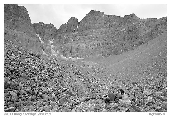 Hikers at the base of the North Face of Wheeler Peak. Great Basin National Park (black and white)
