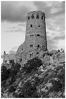 Desert watchtower with tourists at sunset. Grand Canyon National Park ( black and white)