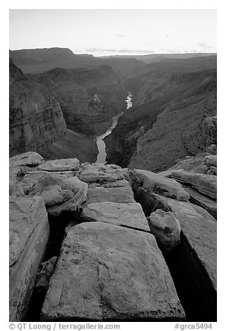 Cracks and Colorado River at Toroweap, dusk. Grand Canyon National Park, Arizona, USA.