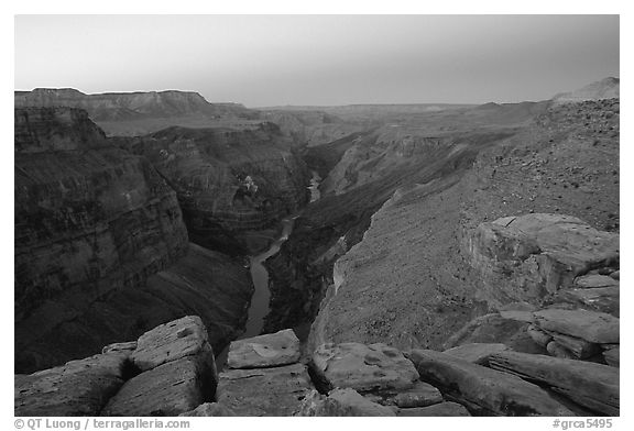 Cracked rocks and Colorado River at Toroweap, dawn. Grand Canyon National Park (black and white)