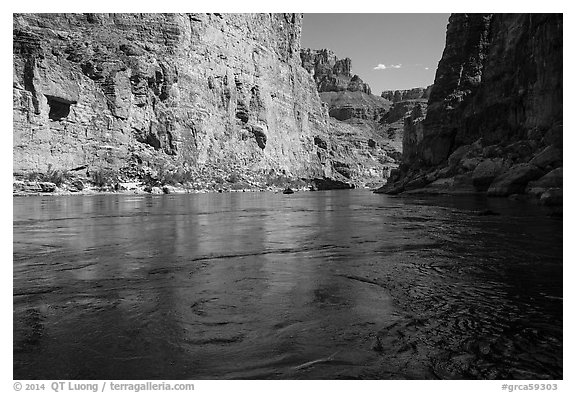Colorado River flowing between steep cliffs in Marble Canyon. Grand Canyon National Park (black and white)