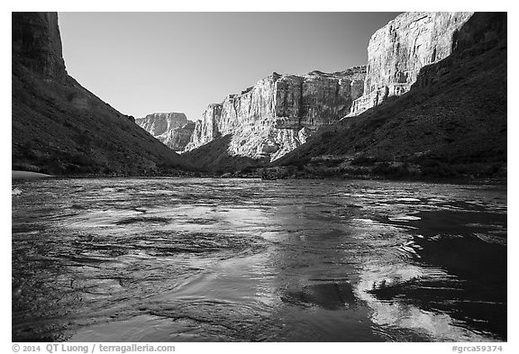 Cliffs reflected in Colorado River rapids, morning. Grand Canyon National Park (black and white)