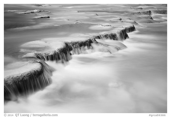 Little Colorodo River flows over travertine terraces. Grand Canyon National Park (black and white)