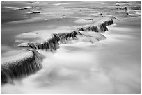 Little Colorodo River flows over travertine terraces. Grand Canyon National Park ( black and white)