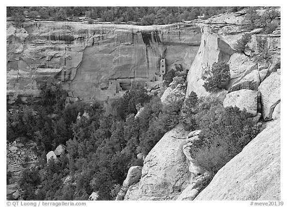 Square Tower house at the base of Long Mesa cliffs. Mesa Verde National Park (black and white)