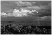 Rainbow and thunderstorm clouds over mesa. Mesa Verde National Park, Colorado, USA. (black and white)