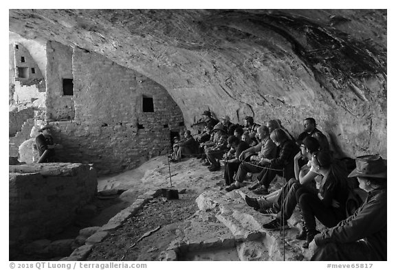 Ranger talks during guided tour of Long House. Mesa Verde National Park (black and white)