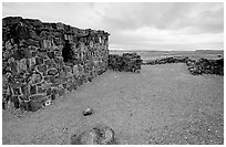 Agate House, reconstitution of native house made of petrified wood. Petrified Forest National Park ( black and white)