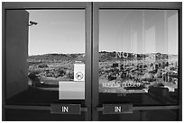 Giant Logs, Rainbow Forest Museum  window reflexion. Petrified Forest National Park ( black and white)