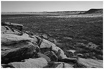 Petroglyphs on rocks overlooking plain, Puerco Pueblo. Petrified Forest National Park ( black and white)