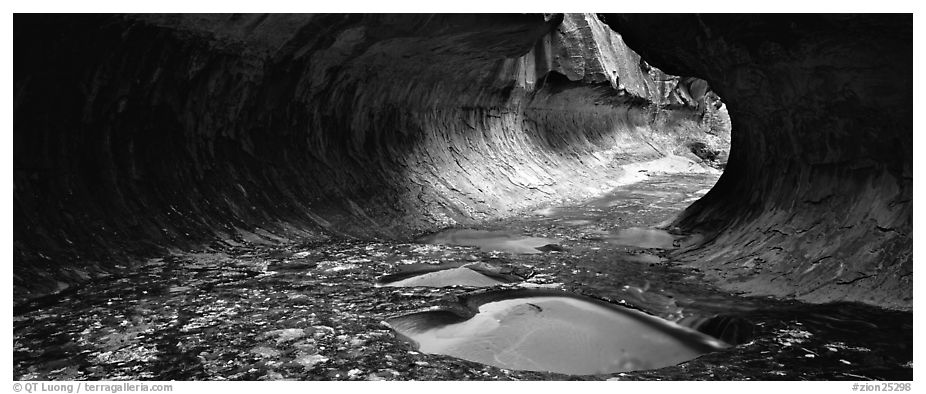 Tunnel-shaped opening of the Subway. Zion National Park (black and white)