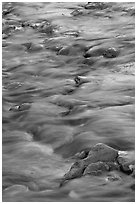 Water flowing over stones in Virgin River. Zion National Park, Utah, USA. (black and white)