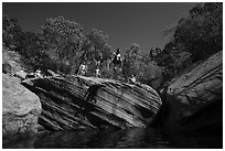 Jumping into water at swimming hole, Pine Creek. Zion National Park ( black and white)