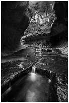 Water cascading over pools, the Subway. Zion National Park ( black and white)