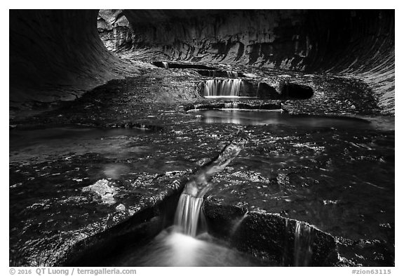 Cascades in tunnel-shaped canyon, the Subway. Zion National Park (black and white)