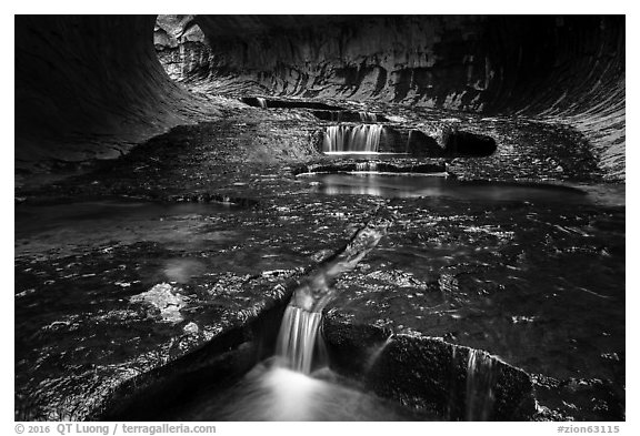 Cascades in tunnel-shaped canyon, the Subway. Zion National Park (black and white)