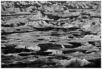 Badland ridges and prairie from above, sunrise. Badlands National Park, South Dakota, USA. (black and white)