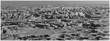 Prairie mixed with badland ridges. Badlands National Park (Panoramic black and white)