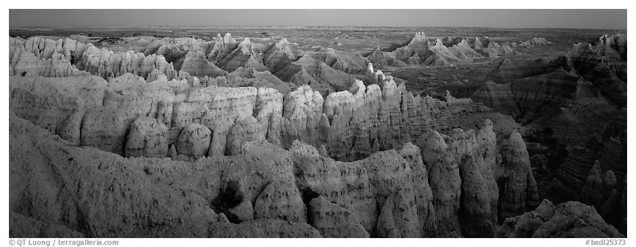 Eroded badland scenery at dusk, Stronghold Unit. Badlands National Park (black and white)