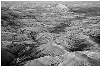 Eroded buttes at sunrise, Panorama Point. Badlands National Park, South Dakota, USA. (black and white)