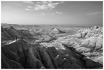 Park visitor looking, Panorama Point. Badlands National Park, South Dakota, USA. (black and white)