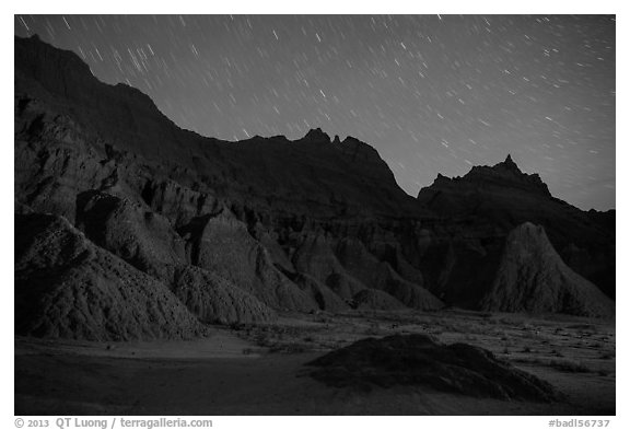 Badlands and star trails. Badlands National Park, South Dakota, USA.