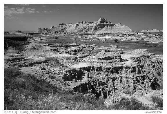 Badlands below and above prairie. Badlands National Park (black and white)