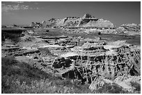 Badlands below and above prairie. Badlands National Park ( black and white)