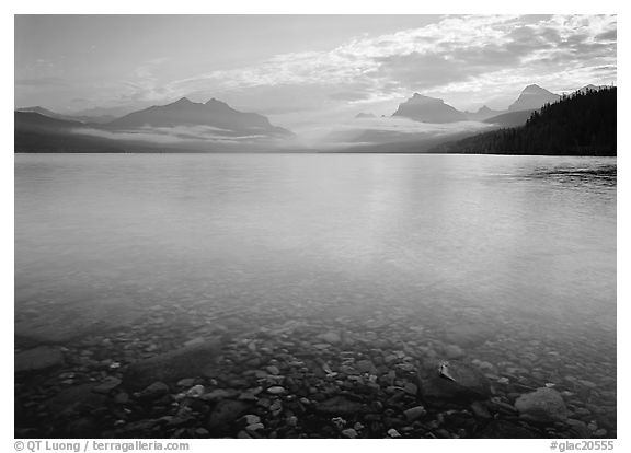 Lake McDonald with clouds reflected in early morning. Glacier National Park (black and white)