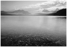 Lake McDonald with clouds reflected in early morning. Glacier National Park ( black and white)