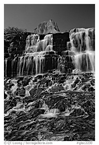 Waterfall at hanging gardens, Logan pass. Glacier National Park, Montana, USA.