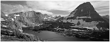 Alpine lake and triangular peak. Glacier National Park (Panoramic black and white)
