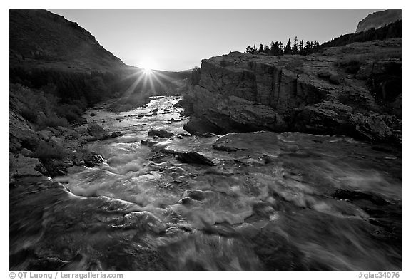 Outlet stream of Swiftcurrent Lake, sunrise. Glacier National Park, Montana, USA.