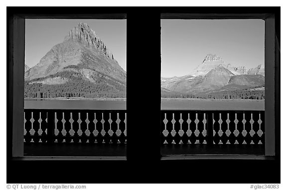 Grinnell Point and Swiftcurrent Lake framed by windows of Many Glacier Lodge. Glacier National Park, Montana, USA.