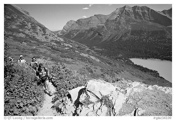 Women hiking on the Grinnell Glacier trail. Glacier National Park, Montana, USA.