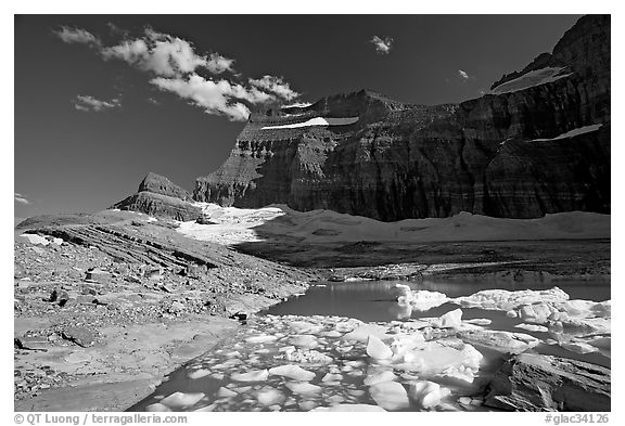 Upper Grinnell Lake with icebergs, late afternoon. Glacier National Park, Montana, USA.