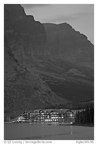 Many Glacier lodge and Swiftcurrent Lake at dusk. Glacier National Park, Montana, USA.