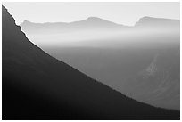 Ridge and light seen from Logan Pass. Glacier National Park, Montana, USA. (black and white)