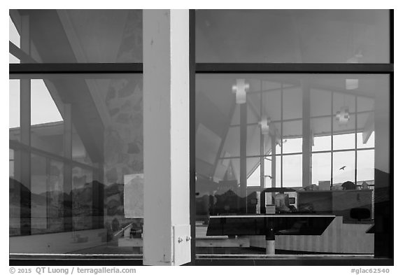 Mountains, Saint Mary visitor center window reflexion. Glacier National Park (black and white)